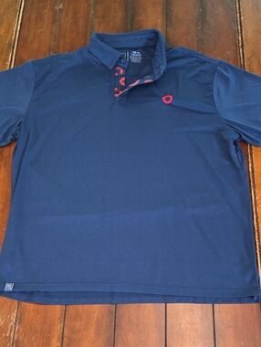 Section 119 Phish Men's Navy Polo Shirt with Red Donut Accents